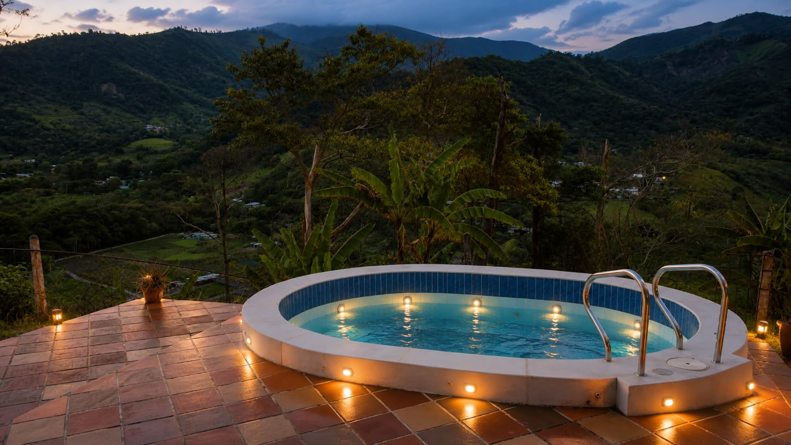 Jacuzzi iluminado con vista a las montañas